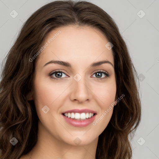 Joyful white young-adult female with long  brown hair and green eyes