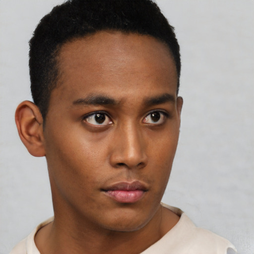 Neutral black young-adult male with short  brown hair and brown eyes