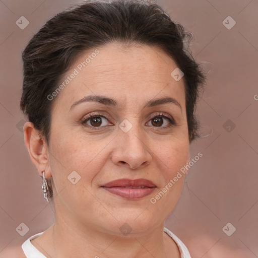 Joyful white adult female with short  brown hair and brown eyes