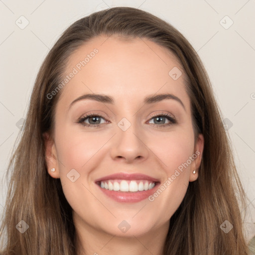 Joyful white young-adult female with long  brown hair and grey eyes