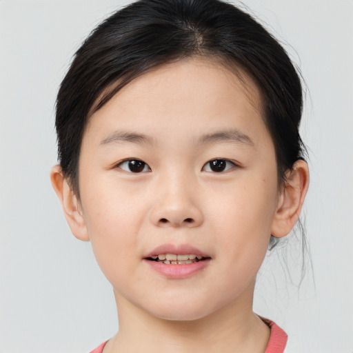 Joyful asian child female with medium  brown hair and brown eyes