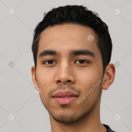 Neutral latino young-adult male with short  black hair and brown eyes