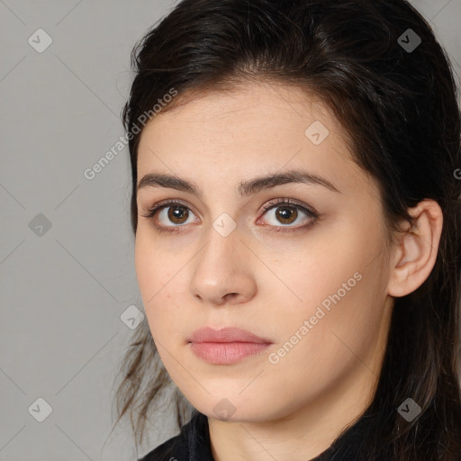 Neutral white young-adult female with long  brown hair and brown eyes