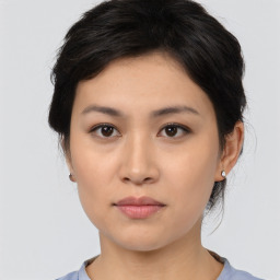 Neutral asian young-adult female with medium  black hair and brown eyes