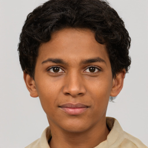 Joyful latino young-adult male with short  brown hair and brown eyes