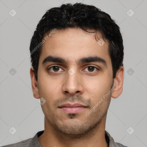 Neutral latino young-adult male with short  black hair and brown eyes