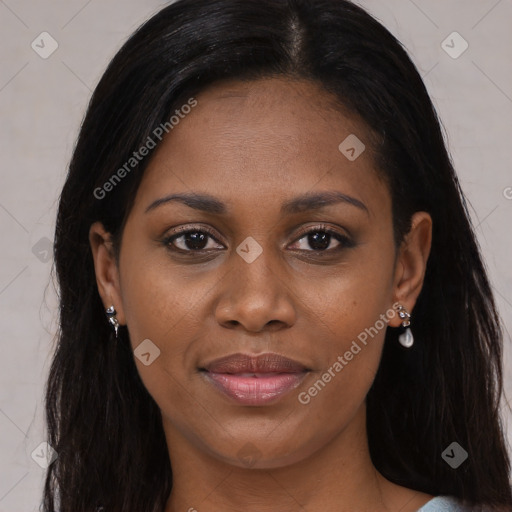 Joyful black young-adult female with long  brown hair and brown eyes