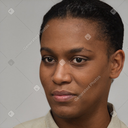 Joyful black young-adult female with short  brown hair and brown eyes