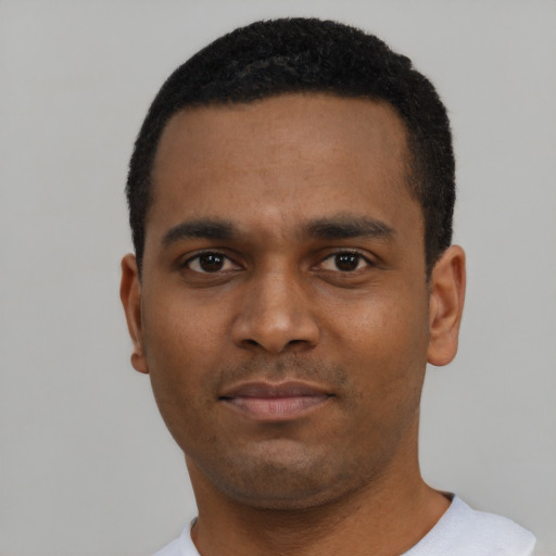 Neutral black young-adult male with short  black hair and brown eyes