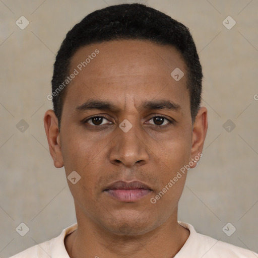 Neutral latino young-adult male with short  black hair and brown eyes