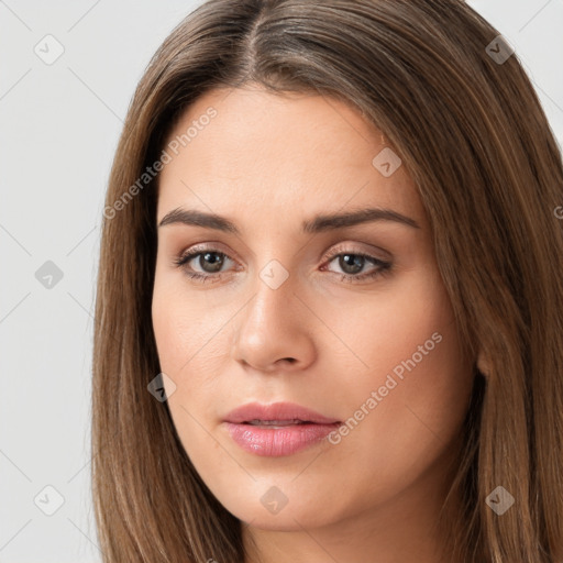 Neutral white young-adult female with long  brown hair and brown eyes