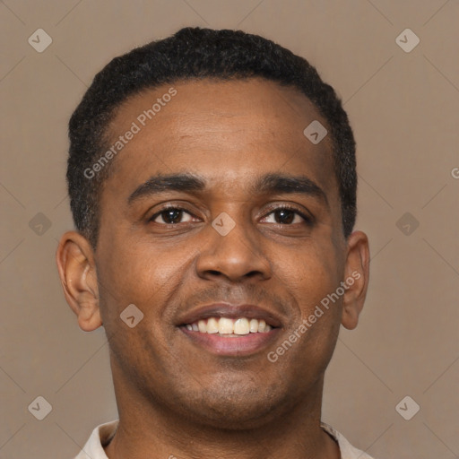 Joyful latino young-adult male with short  brown hair and brown eyes
