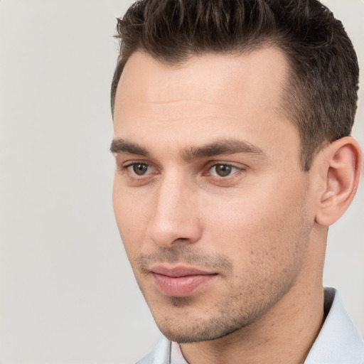 Neutral white young-adult male with short  brown hair and brown eyes