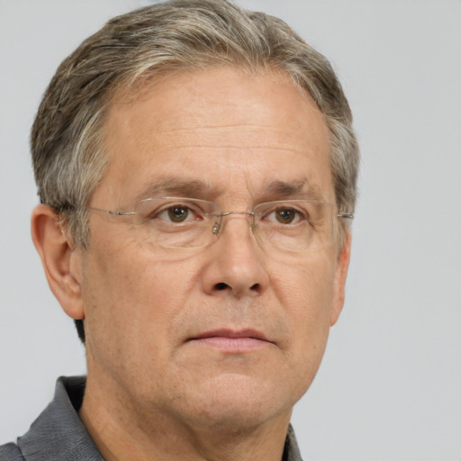 Neutral white middle-aged male with short  gray hair and brown eyes