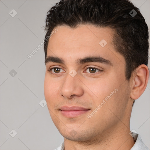 Joyful white young-adult male with short  brown hair and brown eyes