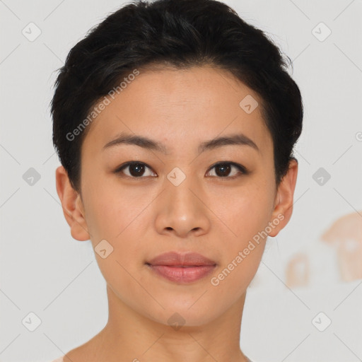 Joyful asian young-adult female with short  brown hair and brown eyes