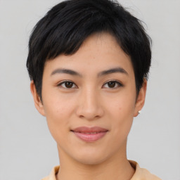 Joyful asian young-adult female with short  black hair and brown eyes