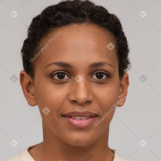 Joyful black young-adult female with short  brown hair and brown eyes