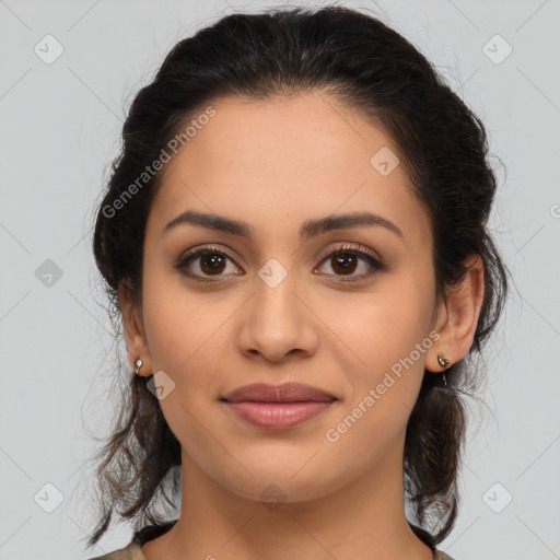 Joyful latino young-adult female with medium  brown hair and brown eyes