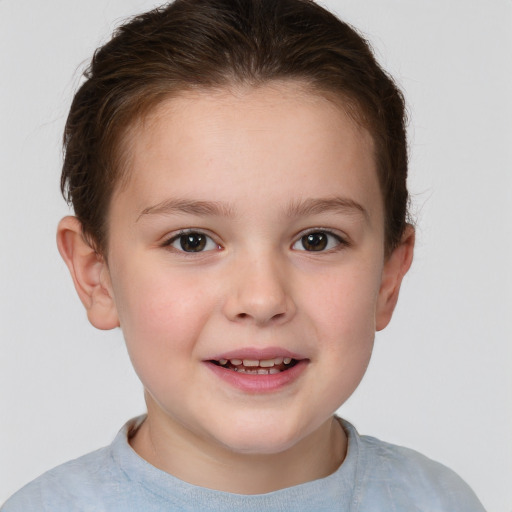 Joyful white child female with short  brown hair and brown eyes