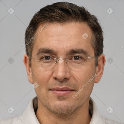 Joyful white adult male with short  brown hair and brown eyes