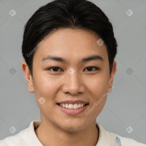 Joyful asian young-adult female with short  brown hair and brown eyes