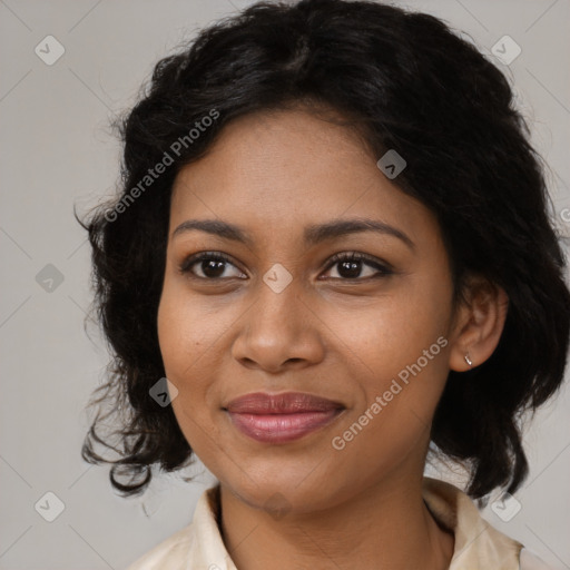 Joyful black young-adult female with medium  brown hair and brown eyes