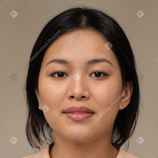 Joyful asian young-adult female with medium  black hair and brown eyes