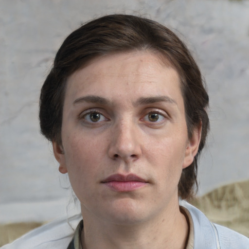 Neutral white young-adult female with short  brown hair and brown eyes