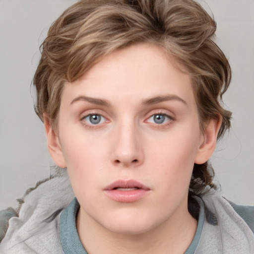 Neutral white young-adult female with medium  brown hair and blue eyes