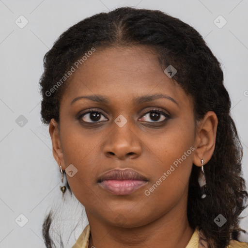 Joyful black young-adult female with medium  brown hair and brown eyes