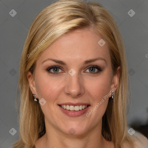 Joyful white young-adult female with medium  brown hair and blue eyes