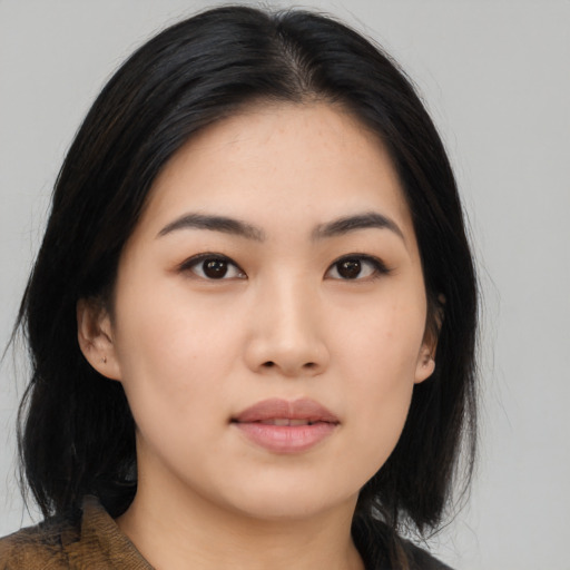 Neutral asian young-adult female with medium  black hair and brown eyes