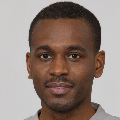Neutral black young-adult male with short  brown hair and brown eyes