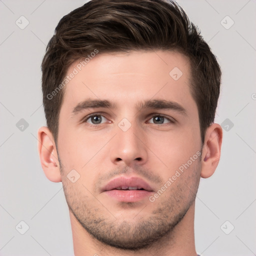 Neutral white young-adult male with short  brown hair and brown eyes