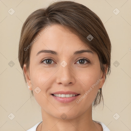 Joyful white young-adult female with short  brown hair and brown eyes