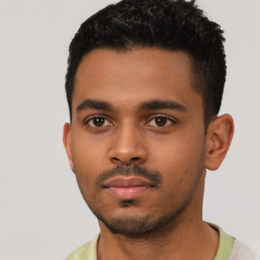 Neutral black young-adult male with short  black hair and brown eyes