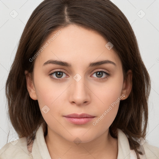 Neutral white young-adult female with medium  brown hair and brown eyes