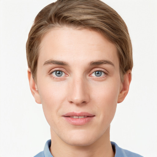 Joyful white young-adult male with short  brown hair and blue eyes