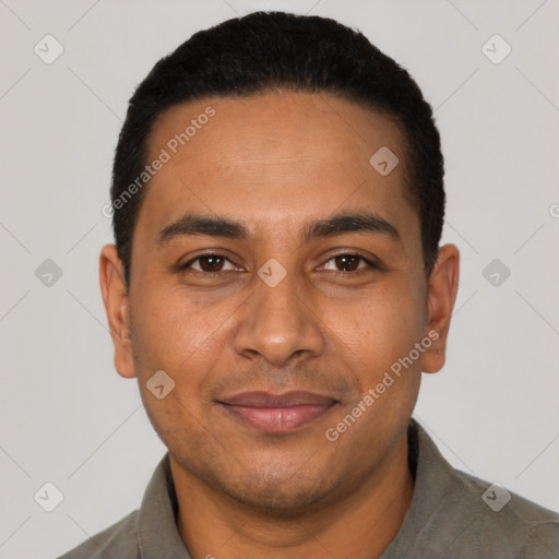 Joyful latino young-adult male with short  black hair and brown eyes