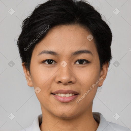 Joyful asian young-adult female with short  black hair and brown eyes