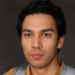 Neutral white young-adult male with short  black hair and brown eyes