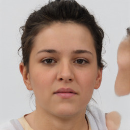 Neutral white young-adult female with short  brown hair and brown eyes