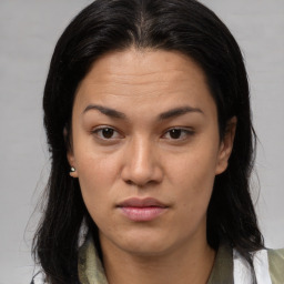 Neutral asian young-adult female with medium  brown hair and brown eyes