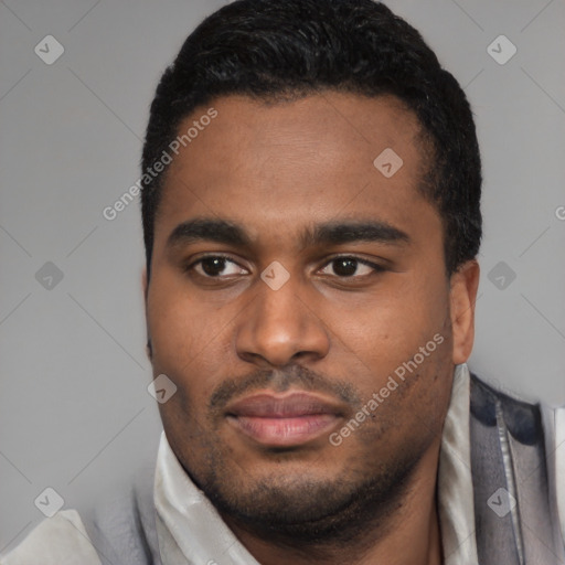 Joyful latino young-adult male with short  black hair and brown eyes