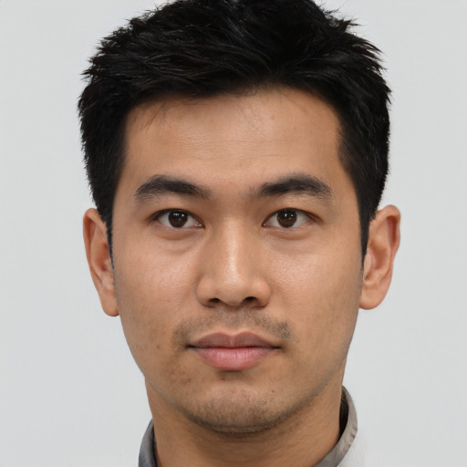 Neutral asian young-adult male with short  black hair and brown eyes