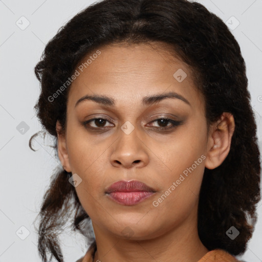 Joyful latino young-adult female with medium  brown hair and brown eyes