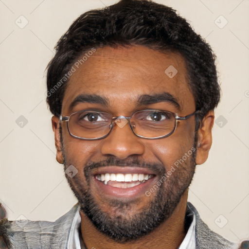 Joyful black young-adult male with short  black hair and brown eyes