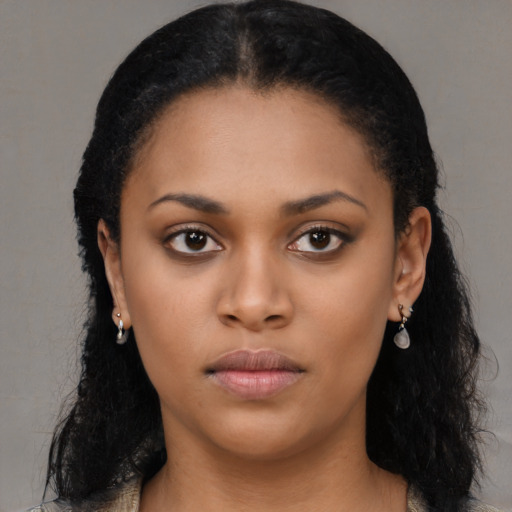 Neutral black young-adult female with long  black hair and brown eyes