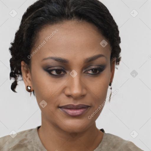 Joyful black young-adult female with short  brown hair and brown eyes